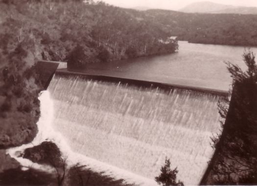 Water flowing over Cotter Dam