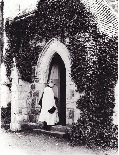 Rev Pierce Galliard Smith, Rector of St John's (1855-1906), on the steps of the church