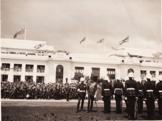 Ceremony in front of Parliament House with the Duke of Gloucester inspecting a parade of soldiers
