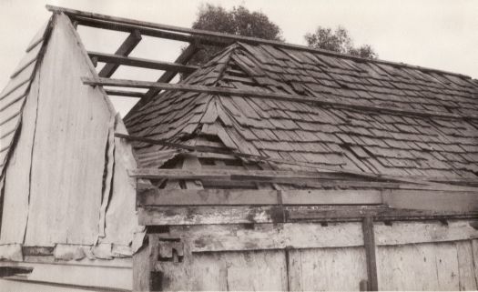 Fern Hill homestead, showing original shingle roof, during demolition in 1958. The site was in Mackennal Street, Lyneham.