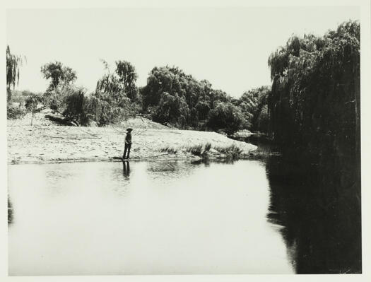 Molonglo River showing a man fishing from the banks