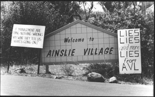 Protest signs, Ainsle Village