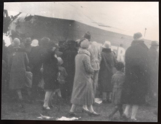 A close up view of the crowd and the 'Southern Cross' plane.