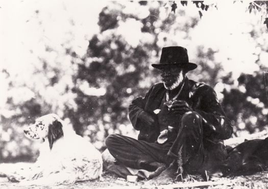 Aboriginal man pictured with his dog