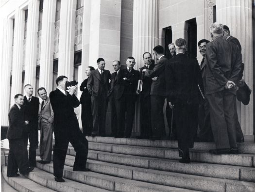 Group of men on the steps of the Institute of Anatomy
