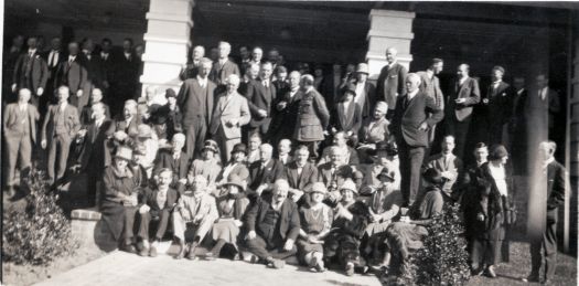 Group in front of Hotel Canberra. Includes W.M. Hughes.