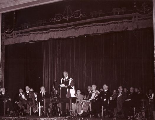 Conferring of ANU degrees at Albert Hall. Sir Robert Garran speaking.