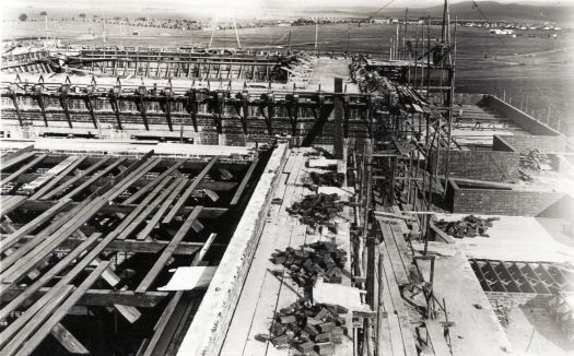 View from the roof of Parliament House under construction with the Hotel Kurrajong in the distance