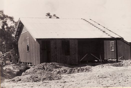 Back view of portable cottage at Acton