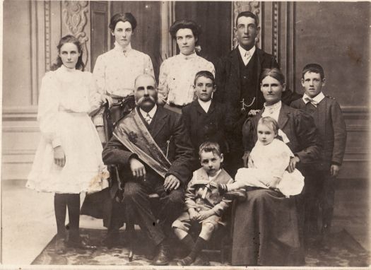 Gallaghers of "Erindale". Left to right at back - Margaret (Mrs Plant), Mary, Catherine, Michael, Peter.  Middle - Patrick, Sarsfield, Catherine (nee Wall), Ann (being nursed). Front - Lawrence Gallagher.