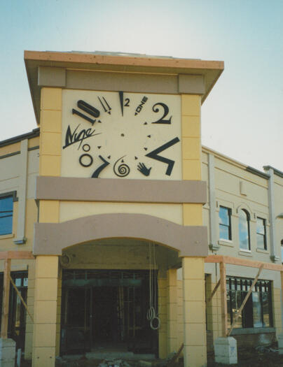 View of the Gungahlin Marketplace clock on the corner of Hibberson Street and Gungahlin Place.