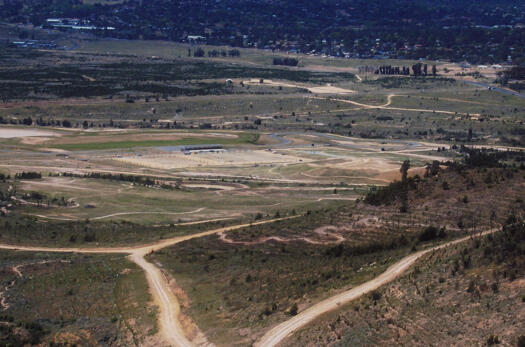 View from top of Mt Stromlo looking east down over Stromlo Forest Park to Wright and North Weston.