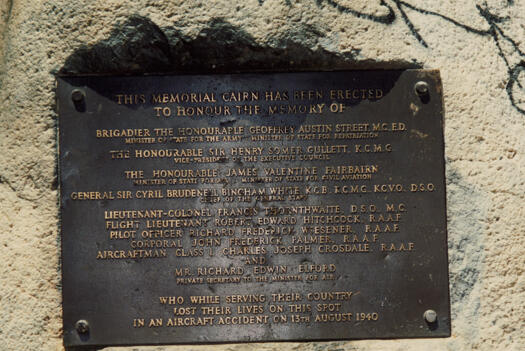 Plaque on memorial cairn, Fairbairn pine forest, to 9 men killed in plane crash, 13 August 1940