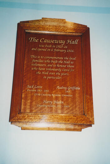 Commemorative plaque in the Causeway Hall to the families who built the hall in 1925.