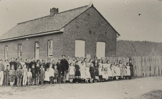 Opened 1851. Shows Alfred Davidson (teacher) and pupils.