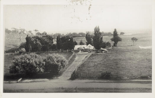 Looking from the Queanbeyan - Yass Road up a long driveway.